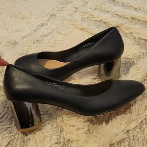 Black vegan leather heels.